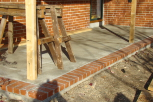 Concrete Porch with Brick Trim